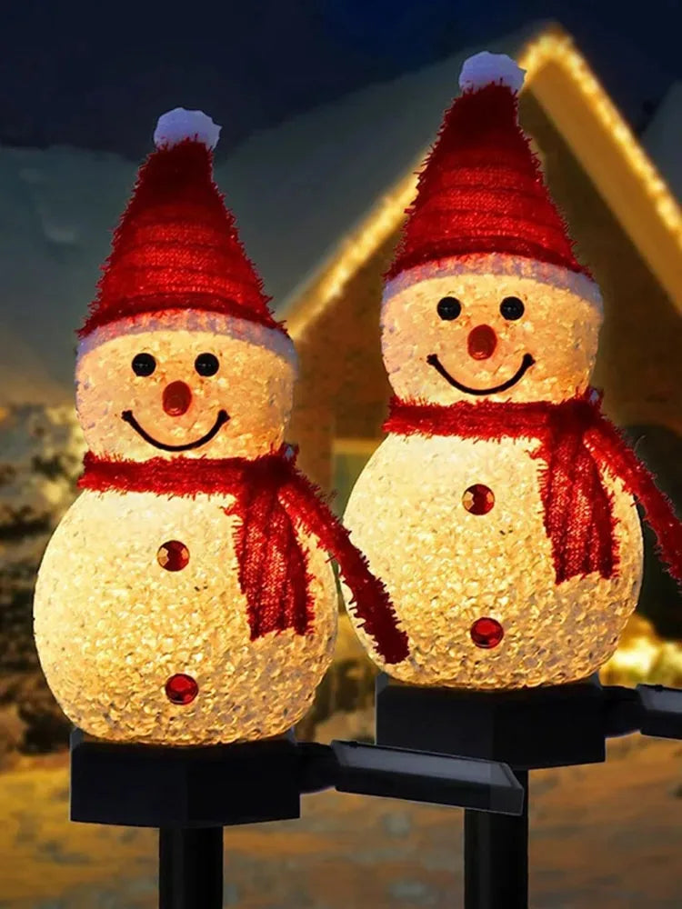 Décorations de Noël Lumière solaire Bonhomme de neige Noël Extérieur Éclairage solaire Pieux pour le couloir, la terrasse et la pelouse